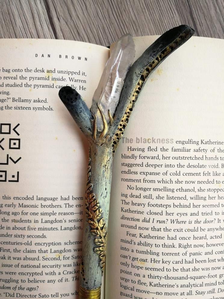 Apollo-themed wand with lemurian quartz and laurel leaves