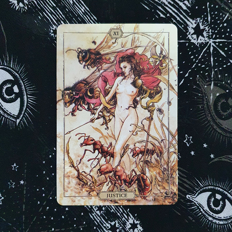 A photo of the Justice card from the Hush Tarot