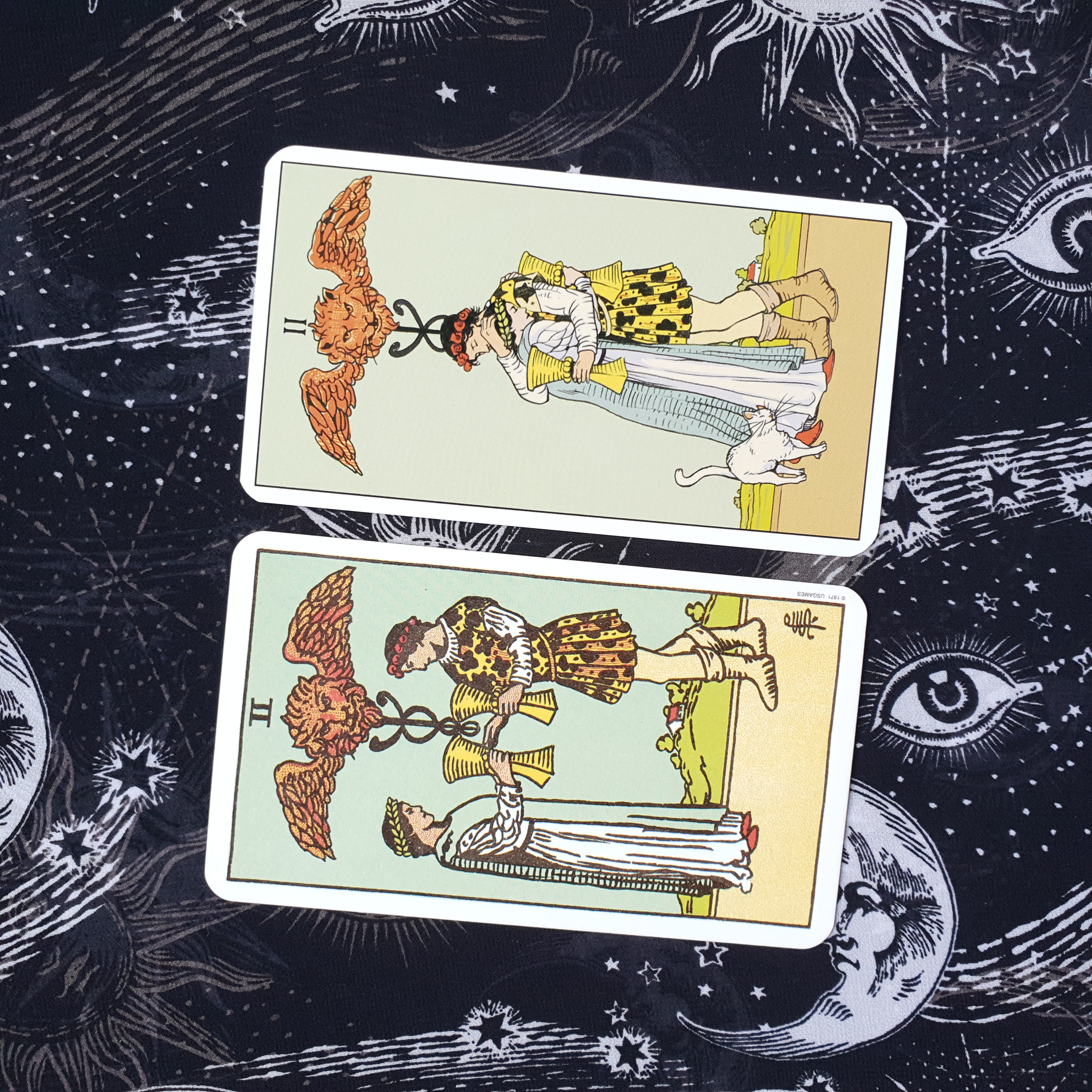 A photo of the Two of Cups card from the Original Rider Waite Smith Tarot and the After Tarot