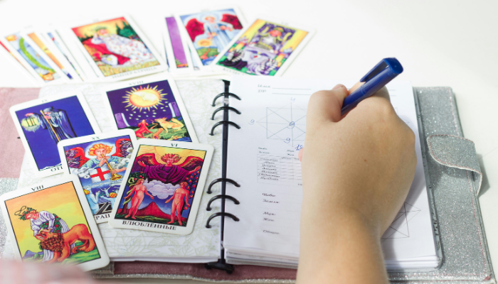 Photo of a student taking tarot courses